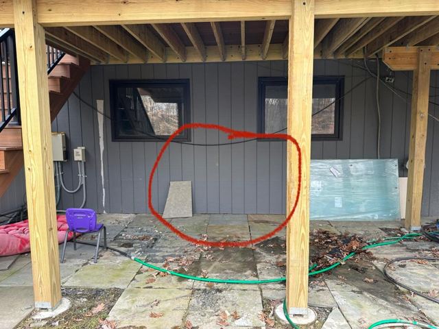 Concrete Patio & Aluminum Fence — Before