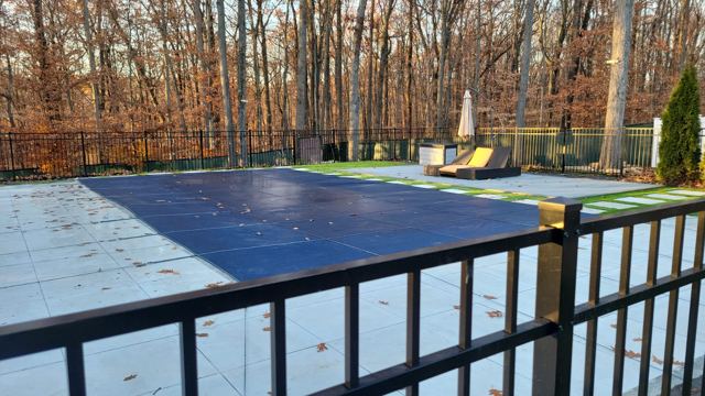 Pool Deck & Aluminum Fence — After