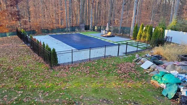 Pool Deck & Aluminum Fence — After