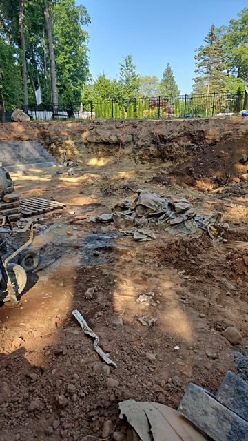 Granite Retaining Wall & Pool Pavers — Before