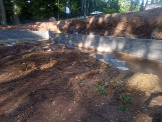 Granite Retaining Wall & Pool Pavers — During