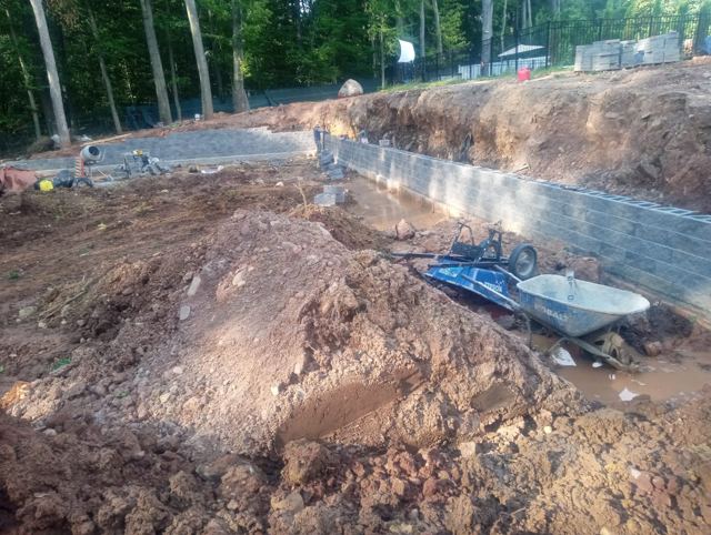Granite Retaining Wall & Pool Pavers — During