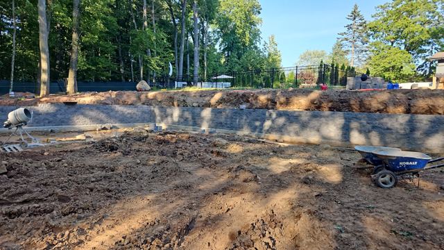 Granite Retaining Wall & Pool Pavers — During