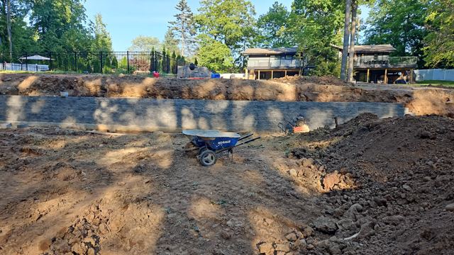 Granite Retaining Wall & Pool Pavers — During
